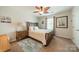 Light bedroom featuring decorative fan, simple decor, and accent lighting at 16507 Palisades Commons Dr, Charlotte, NC 28278