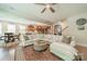 Expansive view of the living room and kitchen, with hardwood floors, lots of light, and an open floor plan at 16507 Palisades Commons Dr, Charlotte, NC 28278