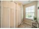 Bright bathroom featuring shower with cream curtain and window for natural light at 16507 Palisades Commons Dr, Charlotte, NC 28278