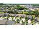 Aerial view of a neighborhood featuring well-maintained homes, lush landscaping, and tree-lined streets at 199 Blossom Ridge Dr, Mooresville, NC 28117