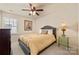 Cozy bedroom with neutral tones, a queen-sized bed, and soft natural light at 199 Blossom Ridge Dr, Mooresville, NC 28117