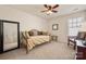 Comfortable bedroom with stylish daybed, neutral decor, and ample natural light at 199 Blossom Ridge Dr, Mooresville, NC 28117