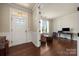 Welcoming foyer with hardwood floors, offering seamless transition to the living area at 199 Blossom Ridge Dr, Mooresville, NC 28117