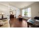Bright office with hardwood floors, with an open view of the living area at 199 Blossom Ridge Dr, Mooresville, NC 28117