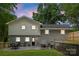 Charming backyard with a patio, seating area, and lush landscaping for outdoor enjoyment at 2009 Edgewater Dr, Charlotte, NC 28210