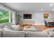 Comfortable living room featuring stylish furnishings, hardwood floors, and bright natural light at 2009 Edgewater Dr, Charlotte, NC 28210
