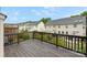 Wooden deck overlooking the lawn and neighboring townhouses at 2151 Belle Vernon Ave, Charlotte, NC 28210