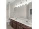 Bright bathroom with double sinks, a large mirror, and modern fixtures at 2151 Belle Vernon Ave, Charlotte, NC 28210
