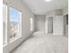 Bright bedroom with soft carpet, large windows, and great natural light at 2151 Belle Vernon Ave, Charlotte, NC 28210