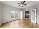 Versatile bonus room featuring hardwood floors and a built-in bar area at 2151 Belle Vernon Ave, Charlotte, NC 28210