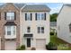 Charming two-story home with a well-maintained front yard and attached garage at 2151 Belle Vernon Ave, Charlotte, NC 28210
