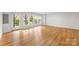 Bright living room with hardwood floors, recessed lighting, and a sliding glass door at 2151 Belle Vernon Ave, Charlotte, NC 28210