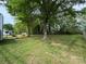 Expansive backyard with mature trees providing plenty of shade at 2504 Faircroft Way, Monroe, NC 28110