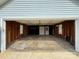 Spacious two-car garage with unfinished interior and lots of potential at 2504 Faircroft Way, Monroe, NC 28110
