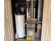 Hot water tank and furnace set up inside a utility closet at 2504 Faircroft Way, Monroe, NC 28110