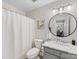 Charming bathroom with a large mirror, modern fixtures, and neutral color palette at 2719 Selwyn Ave # 20, Charlotte, NC 28209