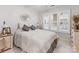 Comfortable bedroom with a window, plush carpeting, and ample natural light at 2719 Selwyn Ave # 20, Charlotte, NC 28209