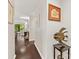 Inviting hallway showcases hardwood floors and stylish decor leading to the living area at 2719 Selwyn Ave # 20, Charlotte, NC 28209