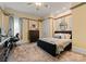 Comfortable bedroom with wainscoting, a plush rug, and a cozy, inviting atmosphere at 2915 Cutter Ct, Waxhaw, NC 28173