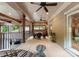 Covered outdoor patio featuring multiple ceiling fans, seating, and scenic views at 2915 Cutter Ct, Waxhaw, NC 28173