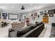 Comfortable theater room featuring a projector, large screen, and cozy seating at 2915 Cutter Ct, Waxhaw, NC 28173