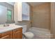 This bathroom offers a tub-shower combo, toilet and vanity with storage at 316 Anne Ave, Waxhaw, NC 28173