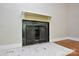 Close-up of a non-working fireplace showcasing the decorative details and design at 316 Anne Ave, Waxhaw, NC 28173