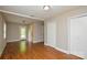 The living room has laminate floors and access to other areas of the home at 316 Anne Ave, Waxhaw, NC 28173