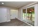 Room featuring slider to screened-in porch and washer/dryer hookups at 316 Anne Ave, Waxhaw, NC 28173
