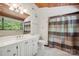 Modern bathroom with vanity, mirror, natural light, and shower at 3165 Laurel Ridge Nw Rd, Hickory, NC 28601