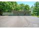 Spacious three-car garage with plenty of parking space and manicured landscaping at 3165 Laurel Ridge Nw Rd, Hickory, NC 28601