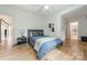 Cozy bedroom with hardwood floors, a comfortable bed, and modern decor at 331 Anthony Cir, Charlotte, NC 28211