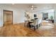 Open dining area with modern table and chairs, hardwood floors, and bright lighting at 331 Anthony Cir, Charlotte, NC 28211