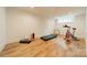 Bright exercise room featuring a treadmill and stationary bike for home fitness at 331 Anthony Cir, Charlotte, NC 28211