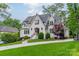 Beautifully landscaped front exterior with a curved walkway leading to the front door at 331 Anthony Cir, Charlotte, NC 28211