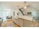 Spacious kitchen featuring a farmhouse sink, large island, and stainless appliances at 331 Anthony Cir, Charlotte, NC 28211