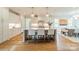 Well-lit kitchen with a large island, pendant lighting, and stainless steel appliances at 331 Anthony Cir, Charlotte, NC 28211