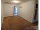 Bedroom with carpet, featuring neutral walls and a modern air conditioning unit at 4194 Buffalo Shoals Rd, Maiden, NC 28650