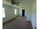 Spacious bedroom with multiple windows and a ceiling fan, providing ample natural light at 4194 Buffalo Shoals Rd, Maiden, NC 28650