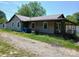 Exterior of house with covered front porch and gravel driveway at 4194 Buffalo Shoals Rd, Maiden, NC 28650
