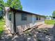 Exterior shot of a home showcasing the simple siding and multiple windows at 4194 Buffalo Shoals Rd, Maiden, NC 28650
