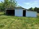 Exterior of a simple shed on a property in need of landscape improvement at 4194 Buffalo Shoals Rd, Maiden, NC 28650