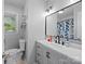 Modern bathroom with stylish vanity, sleek fixtures, and ample lighting showcases contemporary design at 500 Colony Acres Dr, Charlotte, NC 28217
