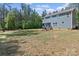 Spacious backyard with deck, ideal for outdoor gatherings and relaxation at 539 Morrison Farm Rd, Troutman, NC 28166
