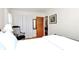 Relaxing bedroom with natural light, hardwood floors, and an attached bathroom at 704 Kingman Dr, Charlotte, NC 28217