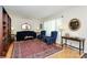 Elegant living room features hardwood floors, sophisticated furnishings, and ample natural light at 704 Kingman Dr, Charlotte, NC 28217