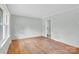 Bright bedroom with natural light, hardwood flooring, and neutral paint at 735 Wilbrown Cir, Charlotte, NC 28217
