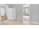 Kitchen featuring tile floors and an entrance to an adjacent room at 735 Wilbrown Cir, Charlotte, NC 28217