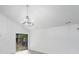 Open concept living room with hardwood floors and backyard access at 8027 Bristle Ln, Charlotte, NC 28214