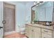 Bathroom featuring a vanity with granite counters and a tiled glass shower at 809 Verney Ln, Charlotte, NC 28226